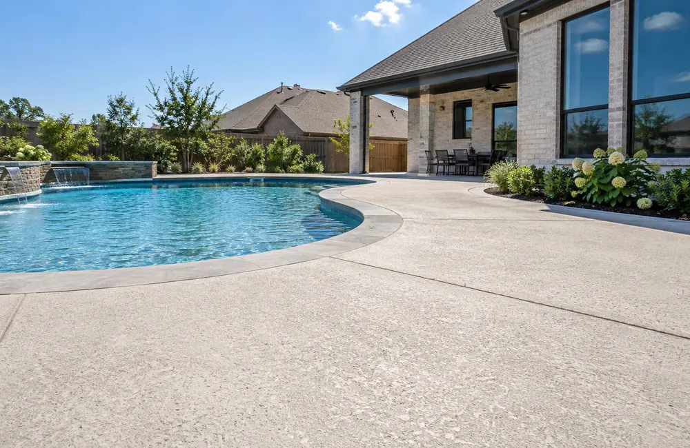 Decorative concrete deck around a swimming pool