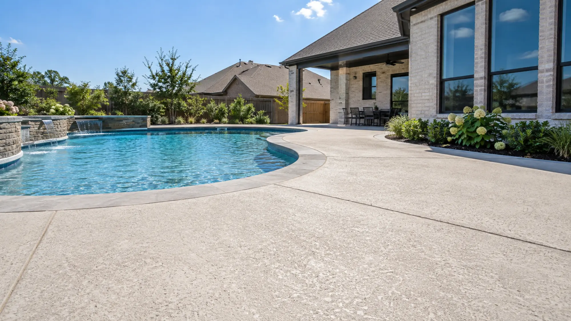 Decorative concrete deck around a swimming pool