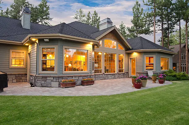 Concrete patio behind a home
